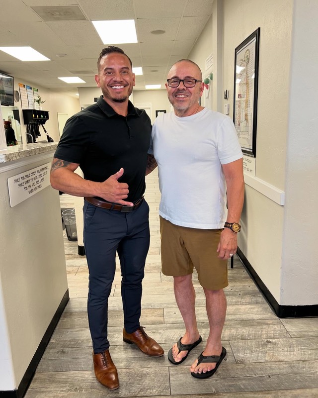 Dr. Steve with a patient after an appointment